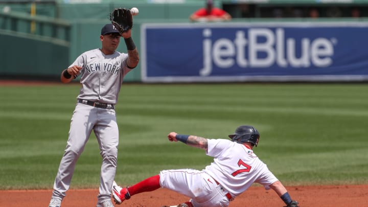 Jun 27, 2021; Boston, Massachusetts, USA; Boston Red Sox catcher Christian Vazquez (7) slides into second base during the first inning against the New York Yankees at Fenway Park. Mandatory Credit: Paul Rutherford-USA TODAY Sports