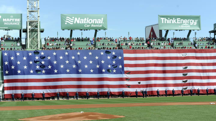 Apr 17, 2017; Boston, MA, USA; The US flag is draped over the center field wall during the national anthem prior to a game between the Boston Red Sox and the Tampa Bay Rays at Fenway Park. Mandatory Credit: Bob DeChiara-USA TODAY Sports