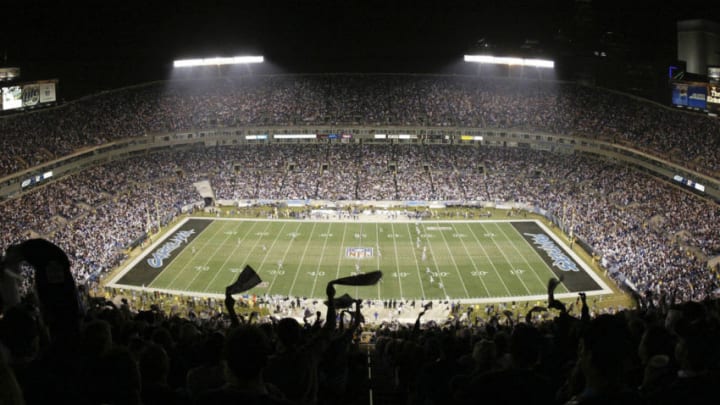 CHARLOTTE, NC - JANUARY 3: Fans watch the opening kickoff of the Dallas Cowboys versus Carolina Panthers NFC Wildcard playoff game from the top of Ericsson Stadium on January 3, 2004 at Ericsson Stadium in Charlotte, North Carolina. (Photo By Streeter Lecka/Getty Images)