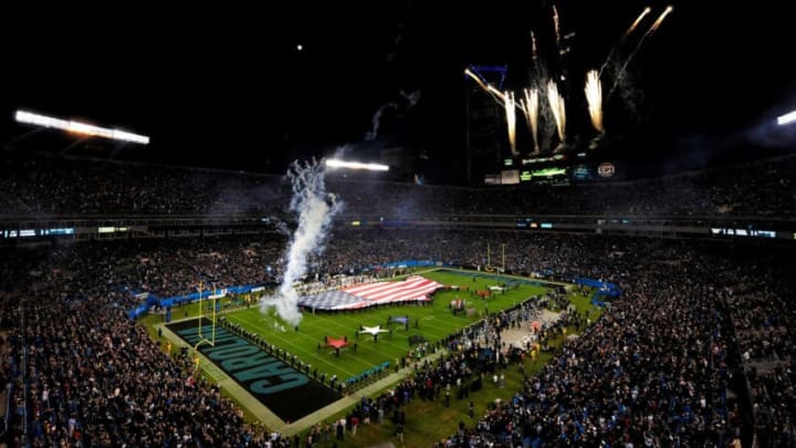 CHARLOTTE, NC - NOVEMBER 18: Fireworks explode over Bank of America Stadium during the National Anthem before a game between the Carolina Panthers and the New England Patriots on November 18, 2013 in Charlotte, North Carolina. (Photo by Grant Halverson/Getty Images)