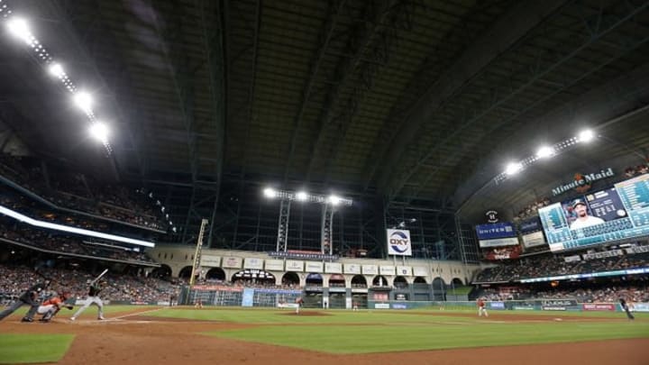 Jun 3, 2016; Houston, TX, USA; General action between the Oakland Athletics and the Houston Astros in the fifth inning at Minute Maid Park. Mandatory Credit: Thomas B. Shea-USA TODAY Sports