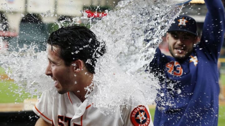 HOUSTON, TEXAS - MAY 28: Garrett Stubbs #11 of the Houston Astros gets doused with water from Lance McCullers, Jr. as he is interviewed after the game at Minute Maid Park on May 28, 2019 in Houston, Texas. (Photo by Bob Levey/Getty Images) HOUSTON, TEXAS - MAY 28: Garrett Stubbs #11 of the Houston Astros gets doused with water from Lance McCullers, Jr. as he is interviewed after the game at Minute Maid Park on May 28, 2019 in Houston, Texas. (Photo by Bob Levey/Getty Images)