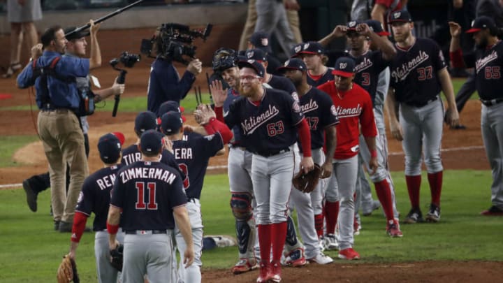 HOUSTON, TEXAS - OCTOBER 29: Sean Doolittle #63 of the Washington Nationals celebrates the 7-2 win against the Houston Astros with his teammates in Game Six of the 2019 World Series at Minute Maid Park on October 29, 2019 in Houston, Texas. (Photo by Tim Warner/Getty Images)