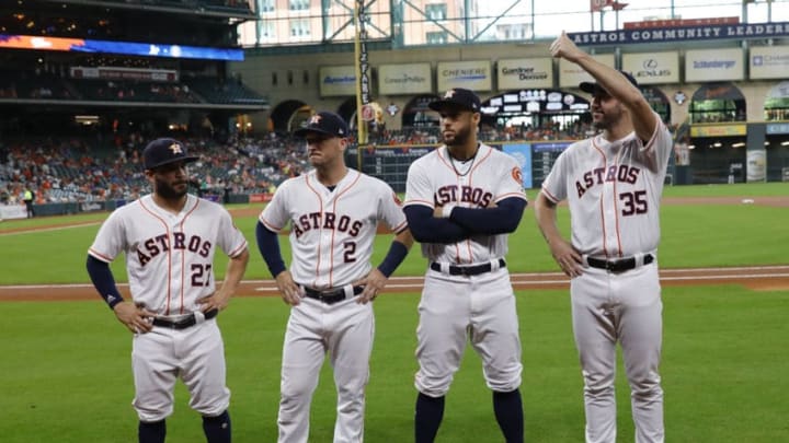 HOUSTON, TX - JULY 12: (L-R) Jose Altuve #27 of the Houston Astros, Alex Bregman #2, George Springer #4 and Justin Verlander #35 acknowledge the crowd before being presented with their 2018 All-Star jerseys at Minute Maid Park on July 12, 2018 in Houston, Texas. (Photo by Bob Levey/Getty Images)