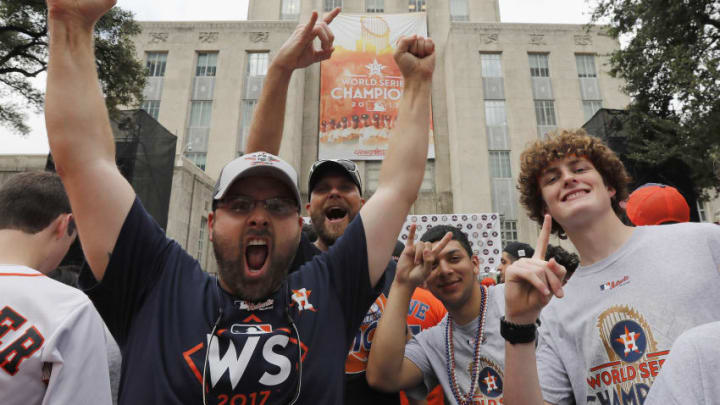 HOUSTON, TX - NOVEMBER 03: Houston Astros fans celebrate at Houston City Hall before the Houston Astros Victory Parade on November 3, 2017 in Houston, Texas. The Astros defeated the Los Angeles Dodgers 5-1 in Game 7 to win the 2017 World Series. (Photo by Tim Warner/Getty Images)
