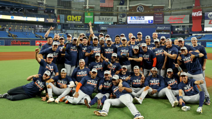 ST PETERSBURG, FLORIDA - SEPTEMBER 19: The Houston Astros celebrates winning the American League West Division following a game against the Tampa Bay Rays at Tropicana Field on September 19, 2022 in St Petersburg, Florida. (Photo by Mike Ehrmann/Getty Images)