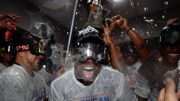 NEW YORK, NEW YORK - OCTOBER 23: Hector Neris #50 and Christian Vazquez #9 of the Houston Astros celebrate in the locker room after defeating the New York Yankees 6-5 in game four of the American League Championship Series to advance to the World Series at Yankee Stadium on October 23, 2022 in the Bronx borough of New York City. (Photo by Sarah Stier/Getty Images)