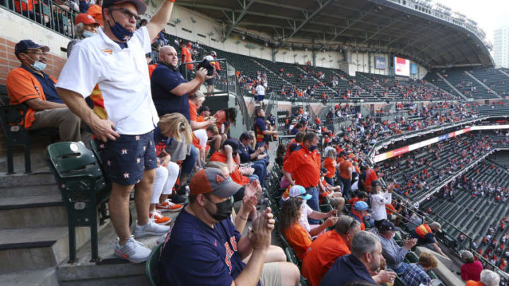 Apr 8, 2021; Houston, Texas, USA; Fans cheer from the stands as the Houston Astros are introduced before the game against the Oakland Athletics at Minute Maid Park. Mandatory Credit: Thomas Shea-USA TODAY Sports