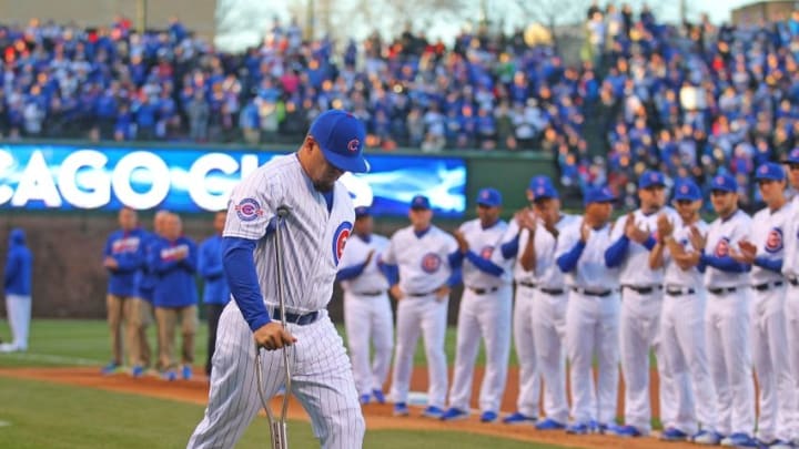 Apr 11, 2016; Chicago, IL, USA; Chicago Cubs left fielder Kyle Schwarber (12) is introduced prior to a game against the Cincinnati Reds at Wrigley Field. Mandatory Credit: Dennis Wierzbicki-USA TODAY Sports