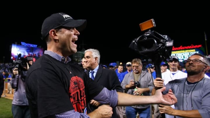 Oct 13, 2015; Chicago, IL, USA; Chicago Cubs president of baseball operations Theo Epstein celebrates on the field after defeating the St. Louis Cardinals in game four of the NLDS at Wrigley Field. Mandatory Credit: Jerry Lai-USA TODAY Sports