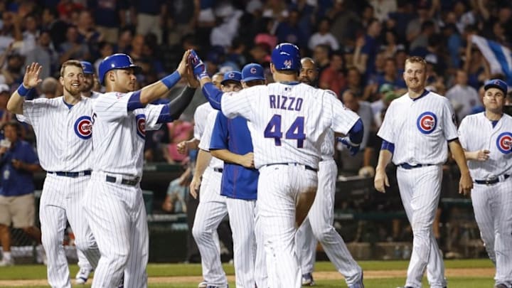 Aug 11, 2016; Chicago, IL, USA; Chicago Cubs first baseman Anthony Rizzo (44) celebrates with teammates after walk off walk against the St. Louis Cardinals during the eleventh inning at Wrigley Field. The Cubs won 4-3. Mandatory Credit: Kamil Krzaczynski-USA TODAY Sports Aug 11, 2016; Chicago, IL, USA; Chicago Cubs first baseman Anthony Rizzo (44) celebrates with teammates after walk off walk against the St. Louis Cardinals during the eleventh inning at Wrigley Field. The Cubs won 4-3. Mandatory Credit: Kamil Krzaczynski-USA TODAY Sports