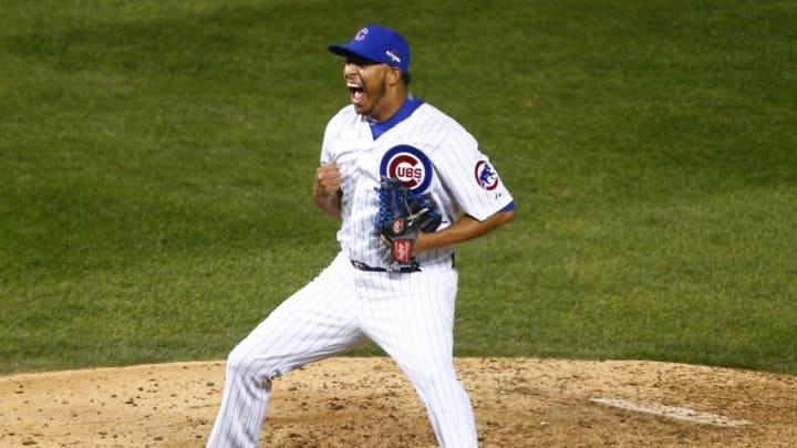 Oct 13, 2015; Chicago, IL, USA; Chicago Cubs relief pitcher Hector Rondon (56) celebrates after defeating the St. Louis Cardinals in game four of the NLDS at Wrigley Field. Mandatory Credit: Caylor Arnold-USA TODAY Sports
