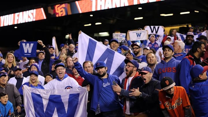 Oct 11, 2016; San Francisco, CA, USA; Chicago Cubs fans celebrate after defeating the San Francisco Giants during game four of the 2016 NLDS playoff baseball game at AT&T Park. Mandatory Credit: John Hefti-USA TODAY Sports