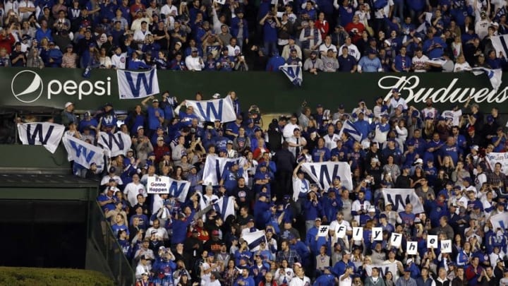 Oct 15, 2016; Chicago, IL, USA; Fans react after the Chicago Cubs defeated the Los Angeles Dodgers in game one of the 2016 NLCS playoff baseball series at Wrigley Field. Cubs won 8-4. Mandatory Credit: Jon Durr-USA TODAY Sports