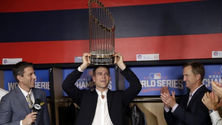 Nov 2, 2016; Cleveland, OH, USA; Chicago Cubs president Theo Epstein holds the commissioner Nov 2, 2016; Cleveland, OH, USA; Chicago Cubs president Theo Epstein holds the commissioner