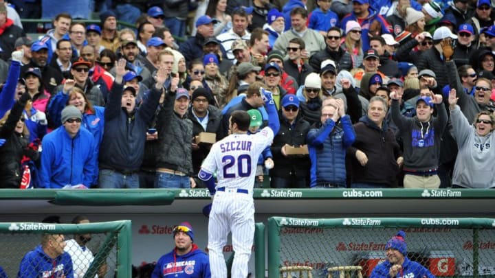 Apr 29, 2016; Chicago, IL, USA; Chicago Cubs left fielder Matt Szczur (Right) waves to the fans after hitting a grand slam home run against the Atlanta Braves during the eighth inning at Wrigley Field. Mandatory Credit: David Banks-USA TODAY Sports