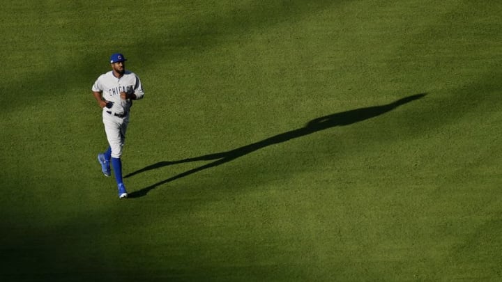 Oct 19, 2016; Los Angeles, CA, USA; Chicago Cubs center fielder Dexter Fowler warms up before game four of the 2016 NLCS playoff baseball series against the Los Angeles Dodgers at Dodger Stadium. Mandatory Credit: Kelvin Kuo-USA TODAY Sports