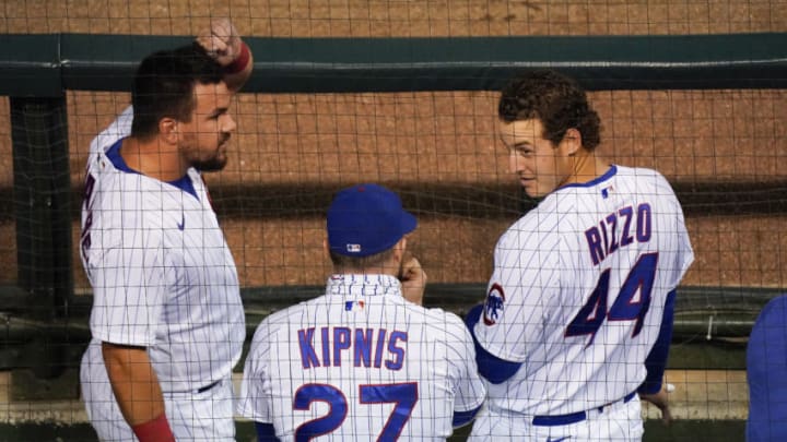 Cubs players Kyle Schwarber, Jason Kipnis and Anthony Rizzo talk during a recent game at Wrigley Field. (Photo by Nuccio DiNuzzo/Getty Images)