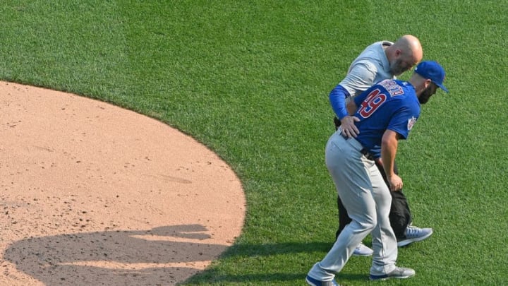 PITTSBURGH, PA - SEPTEMBER 04: Jake Arrieta #49 of the Chicago Cubs is helped off the field by Cubs Assistant Athletic Trainer Ed Halbur after an apparent injury in the third inning during the game against the Pittsburgh Pirates at PNC Park on September 4, 2017 in Pittsburgh, Pennsylvania. (Photo by Justin Berl/Getty Images)