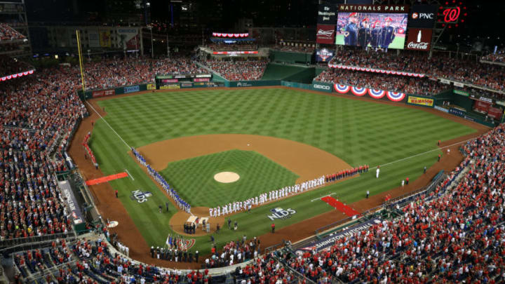 WASHINGTON, DC - OCTOBER 06: The Chicago Cubs and Washington Nationals stand during the national anthem prior to game one of the National League Division Series at Nationals Park on October 6, 2017 in Washington, DC. (Photo by Dan Kubus/Getty Images)