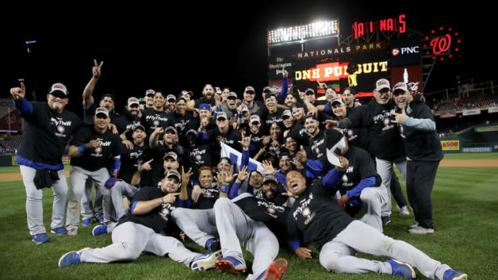 WASHINGTON, DC - OCTOBER 13: The Chicago Cubs celebrate during a team photo after the final out of Game 5 of the National League Divisional Series at Nationals Park on October 13, 2017 in Washington, DC. The Cubs won the game 9-8 and will advance to the National League Championship Series against the Los Angeles Dodgers. (Photo by Win McNamee/Getty Images)