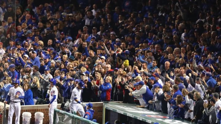 CHICAGO, IL - OCTOBER 22: Willson Contreras #40 of the Chicago Cubs celebrates with manager Joe Maddon at the dugout after hitting a solo home run in the fourth inning against the Los Angeles Dodgers during game six of the National League Championship Series at Wrigley Field on October 22, 2016 in Chicago, Illinois. (Photo by Dylan Buell/Getty Images)