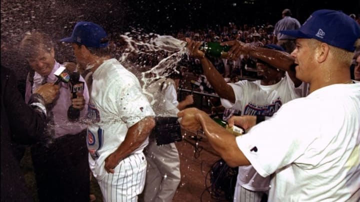 28 Sep 1998: Members of the Chicago Cubs celebrate a victory over the San Francisco Giants by showering their manager Jim Riggleman with champagne following a game at Wrigley Field in Chicago, Illinois. The Cubs defeated the Giants 5-3. Mandatory Credit: