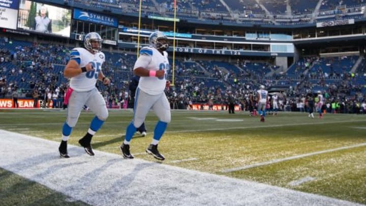 Oct 5, 2015; Seattle, WA, USA; Detroit Lions center Taylor Boggs (65) and guard Manny Ramirez (63) participate in pre game warmups against the Seattle Seahawks at CenturyLink Field. Seattle defeated Detroit, 13-10. Mandatory Credit: Joe Nicholson-USA TODAY Sports