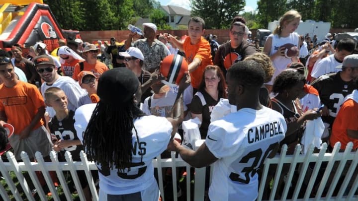 Jul 30, 2015; Berea, OH, USA; Cleveland Browns defensive back Brandon Stephens (35) and defensive back Ibraheim Campbell (30) sign autographs for fans during training camp at the Cleveland Browns practice facility. Mandatory Credit: Ken Blaze-USA TODAY Sports