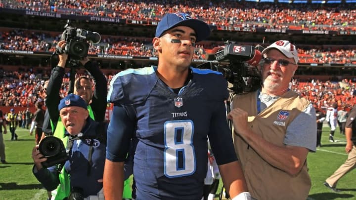 Sep 20, 2015; Cleveland, OH, USA; Tennessee Titans quarterback Marcus Mariota (8) walks off the field after being defeated by the Cleveland Browns 28-14 during the fourth quarter against the Cleveland Browns at FirstEnergy Stadium. Mandatory Credit: Andrew Weber-USA TODAY Sports