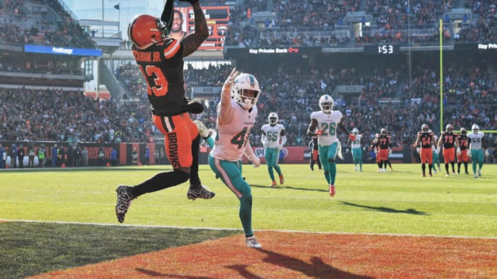 CLEVELAND, OH - NOVEMBER 24: Odell Beckham Jr. #13 of the Cleveland Browns pulls in a 35-yard touchdown catch in the first quarter as Nik Needham #40 of the Miami Dolphins defends at FirstEnergy Stadium on November 24, 2019 in Cleveland, Ohio. (Photo by Jamie Sabau/Getty Images)
