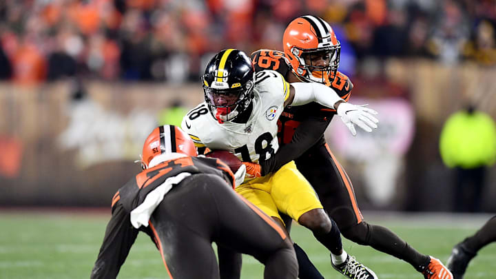 CLEVELAND, OHIO – NOVEMBER 14: Wide receiver Diontae Johnson #18 of the Pittsburgh Steelers is tackled by cornerback Greedy Williams #26 of the Cleveland Browns at FirstEnergy Stadium on November 14, 2019 in Cleveland, Ohio. (Photo by Jamie Sabau/Getty Images)