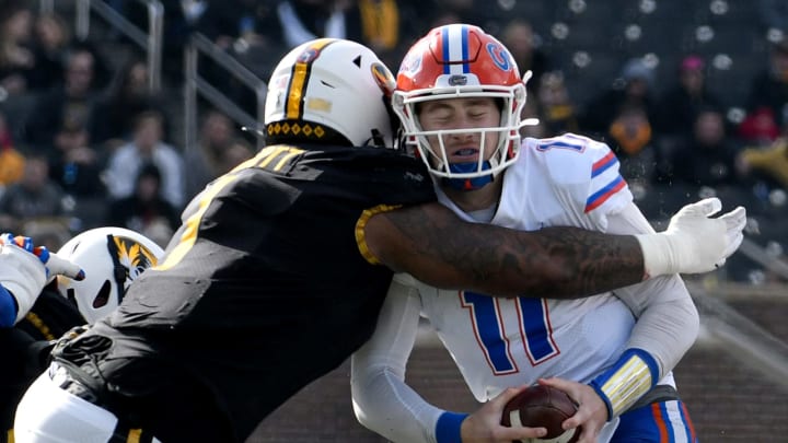 COLUMBIA, MISSOURI – NOVEMBER 16: Quarterback Kyle Trask #11 of the Florida Gators is sacked by defensive lineman Jordan Elliott #1 of the Missouri Tigers second quarter at Faurot Field/Memorial Stadium on November 16, 2019 in Columbia, Missouri. (Photo by Ed Zurga/Getty Images)