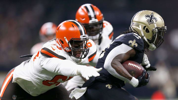 NEW ORLEANS, LA – SEPTEMBER 16: Larry Ogunjobi #65 of the Cleveland Browns attempts to tackle Alvin Kamara #41 of the New Orleans Saints during the second quarter at Mercedes-Benz Superdome on September 16, 2018 in New Orleans, Louisiana. (Photo by Jonathan Bachman/Getty Images)