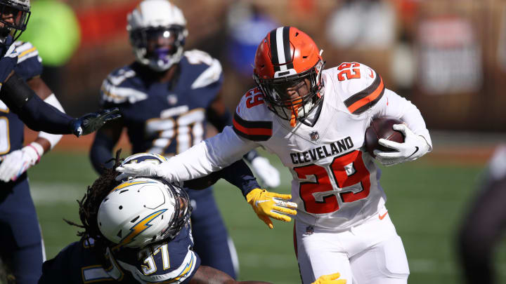 CLEVELAND, OH – OCTOBER 14: Duke Johnson #29 of the Cleveland Browns runs the ball defined by Jahleel Addae #37 of the Los Angeles Chargers in the first half at FirstEnergy Stadium on October 14, 2018 in Cleveland, Ohio. (Photo by Gregory Shamus/Getty Images)