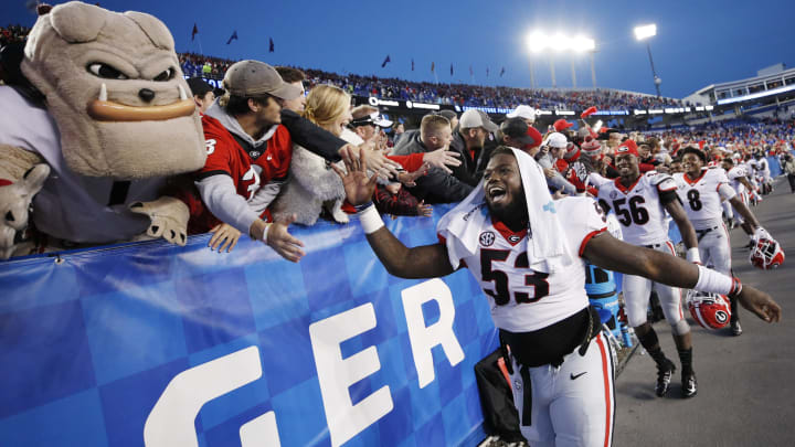 LEXINGTON, KY – NOVEMBER 03: Lamont Gaillard #53 of the Georgia Bulldogs celebrates with fans and teammates after the game against the Kentucky Wildcats at Kroger Field on November 3, 2018 in Lexington, Kentucky. Georgia won 34-17. (Photo by Joe Robbins/Getty Images)