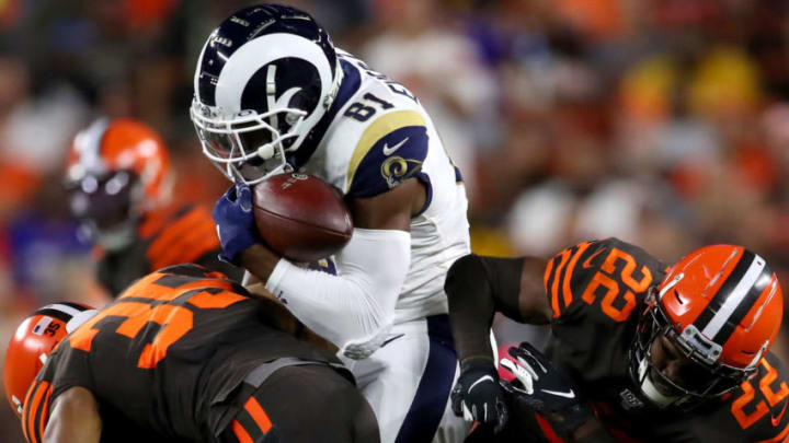 CLEVELAND, OHIO - SEPTEMBER 22: Tight end Gerald Everett #81 of the Los Angeles Rams gets caught between defensive back Jermaine Whitehead #35 and strong safety Eric Murray #22 of the Cleveland Browns during the second quarter of the game at FirstEnergy Stadium on September 22, 2019 in Cleveland, Ohio. (Photo by Gregory Shamus/Getty Images)