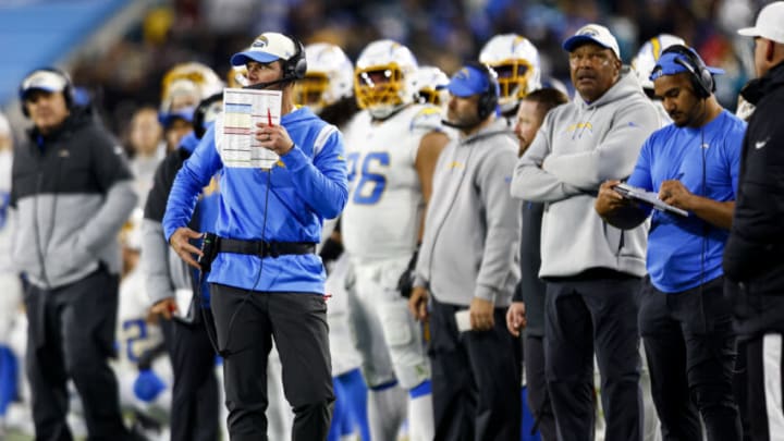 JACKSONVILLE, FL - JANUARY 14: Head coach Brandon Staley of the Los Angeles Chargers coaches from the sidelines during the second quarter of an NFL wild card playoff football game against the Jacksonville Jaguars at TIAA Bank Field on January 14, 2023 in Jacksonville, Florida. (Photo by Kevin Sabitus/Getty Images)