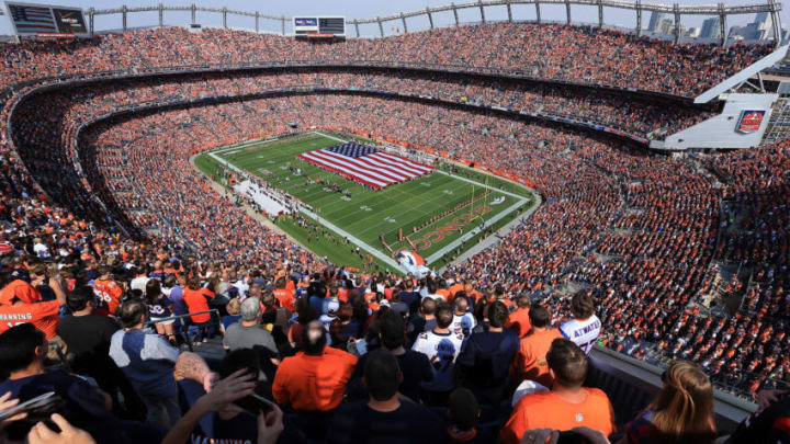 DENVER, CO - SEPTEMBER 23: A general view of the stadium as fans observe the national anthem prior to the Houston Texans facing the Denver Broncos at Sports Authority Field at Mile High on September 23, 2012 in Denver, Colorado. The Texans defeated the Broncos 31-25. (Photo by Doug Pensinger/Getty Images) DENVER, CO - SEPTEMBER 23: A general view of the stadium as fans observe the national anthem prior to the Houston Texans facing the Denver Broncos at Sports Authority Field at Mile High on September 23, 2012 in Denver, Colorado. The Texans defeated the Broncos 31-25. (Photo by Doug Pensinger/Getty Images)
