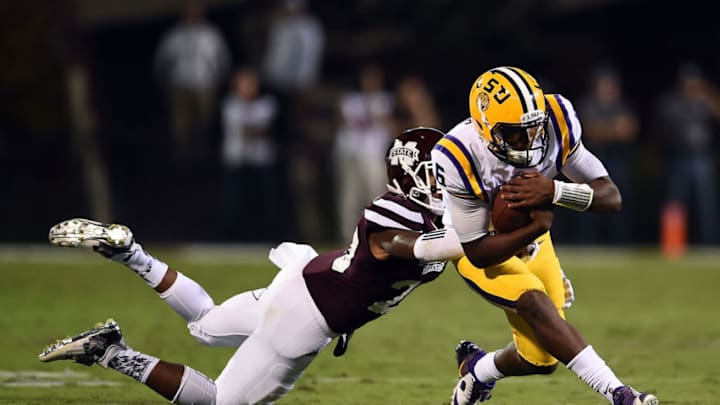 STARKVILLE, MS - SEPTEMBER 12: Brandon Harris #6 of the LSU Tigers is brought down by Brandon Bryant #20 of the Mississippi State Bulldogs during the third quarter of a game at Davis Wade Stadium on September 12, 2015 in Starkville, Mississippi. (Photo by Stacy Revere/Getty Images)