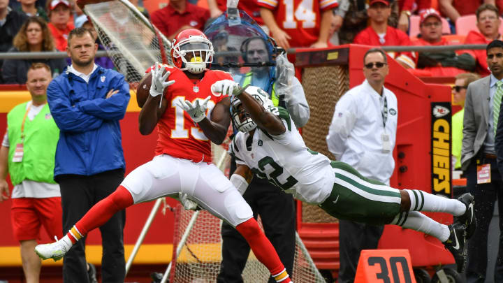 KANSAS CITY, MO – SEPTEMBER 25: Wide receiver Jeremy Maclin #19 of the Kansas City Chiefs attempts to catch a pass with cornerback Juston Burris #19 of the New York Jets in tight coverage at Arrowhead Stadium during the third quarter of the game on September 25, 2016 in Kansas City, Missouri. (Photo by Peter Aiken/Getty Images)