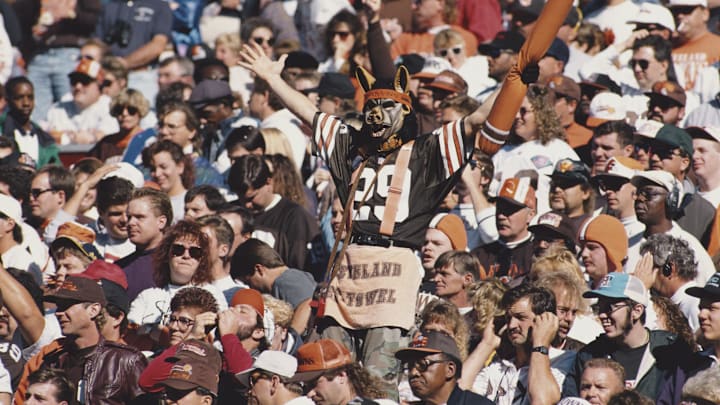 A fan for the Cleveland Browns complete with dog like mask supports his team from the dog pound section of the bleechers during the American Football Conference Central game against the Cincinnati Bengals on 23 October 1994 September 1989 at the Cleveland Municipal Stadium, Cleveland, Ohio, United States. The Browns won the game 37 – 13. (Photo by Rick Stewart/Allsport/Getty Images)