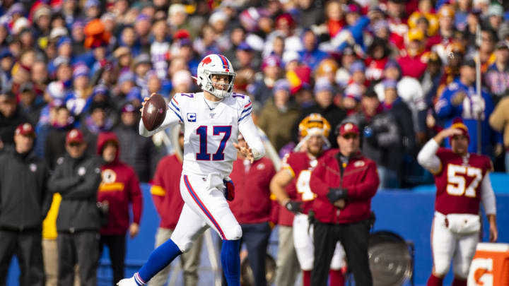 ORCHARD PARK, NY – NOVEMBER 03: Josh Allen #17 of the Buffalo Bills runs with the ball as he pump fakes during the first quarter against the Washington Redskins at New Era Field on November 3, 2019 in Orchard Park, New York. (Photo by Brett Carlsen/Getty Images)