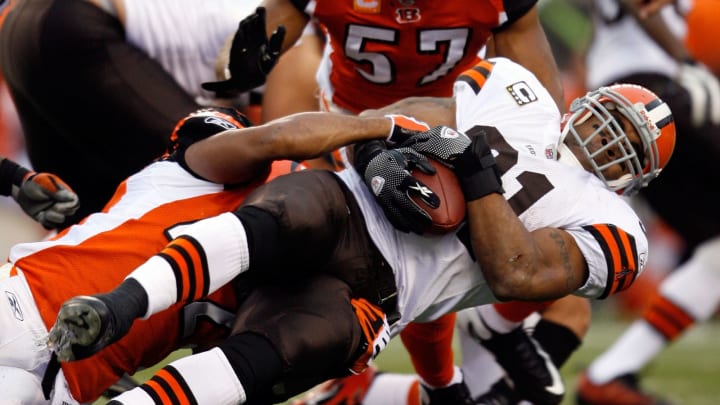 CINCINNATI – NOVEMBER 29: Jamal Lewis #31 of the Cleveland Browns is tackled by Chris Crocker #42 of the Cincinnati Bengals during the NFL game at Paul Brown Stadium on November 29, 2009 in Cincinnati, Ohio. (Photo by Andy Lyons/Getty Images)