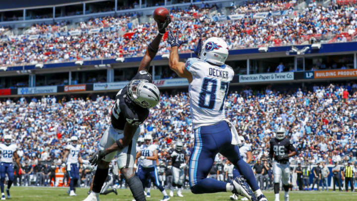 NASHVILLE, TN- SEPTEMBER 10: Safety Karl Joseph #42 of the Oakland Raiders deflects a pass intended for wide receiver Eric Decker #87 of the Tennessee Titans in the first half at Nissan Stadium on September 10, 2017 In Nashville, Tennessee. (Photo by Wesley Hitt/Getty Images) )