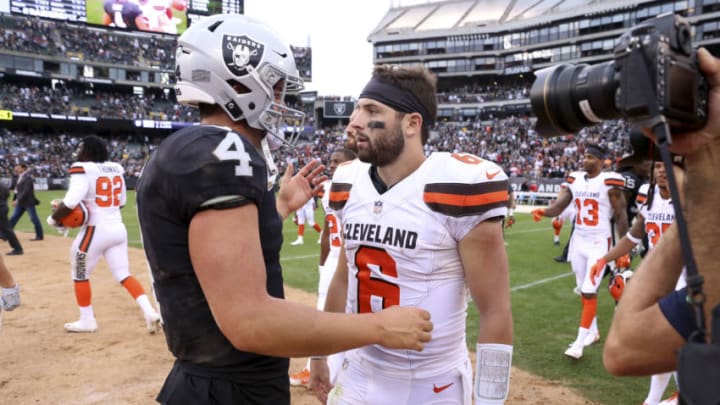 Sep 30, 2018; Oakland, CA, USA; Oakland Raiders quarterback Derek Carr (4) meets with Cleveland Browns quarterback Baker Mayfield (6) after the game at Oakland Coliseum. Mandatory Credit: Cary Edmondson-USA TODAY Sports