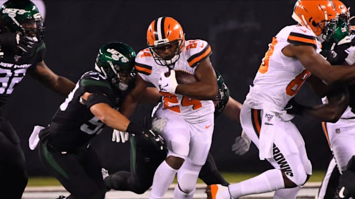 Sep 16, 2019; East Rutherford, NJ, USA;Cleveland Browns running back Nick Chubb (24) runs the ball against New York Jets defensive end John Franklin-Myers (56) during the first quarter at MetLife Stadium. Mandatory Credit: Robert Deutsch-USA TODAY Sports