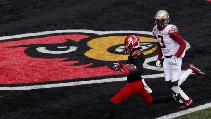 Louisville's Tutu Atwell scores a touchdown for the Cardinals against Florida State.10/24/20Louisville Flstate 18