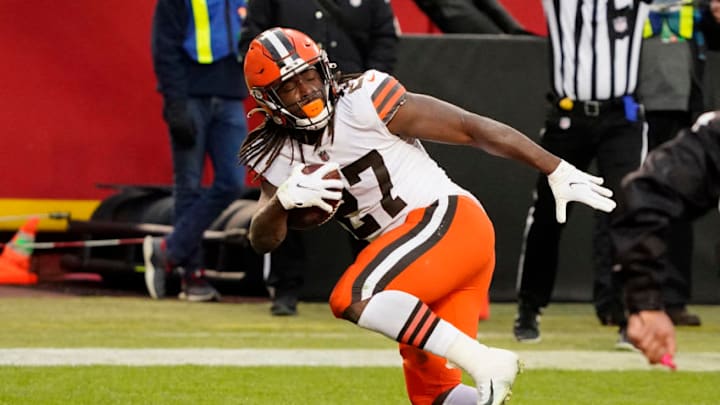 Jan 17, 2021; Kansas City, Missouri, USA; Cleveland Browns running back Kareem Hunt (27) runs the ball in for a touchdown against the Kansas City Chiefs during the second half in the AFC Divisional Round playoff game at Arrowhead Stadium. Mandatory Credit: Jay Biggerstaff-USA TODAY Sports