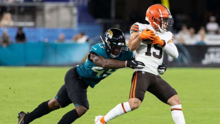 Aug 14, 2021; Jacksonville, Florida, USA; Cleveland Browns wide receiver Ryan Switzer (15) makes a catch over Jacksonville Jaguars linebacker Chapelle Russell (49) in the fourth quarter at TIAA Bank Field. Mandatory Credit: Matt Pendleton-USA TODAY Sports Aug 14, 2021; Jacksonville, Florida, USA; Cleveland Browns wide receiver Ryan Switzer (15) makes a catch over Jacksonville Jaguars linebacker Chapelle Russell (49) in the fourth quarter at TIAA Bank Field. Mandatory Credit: Matt Pendleton-USA TODAY Sports